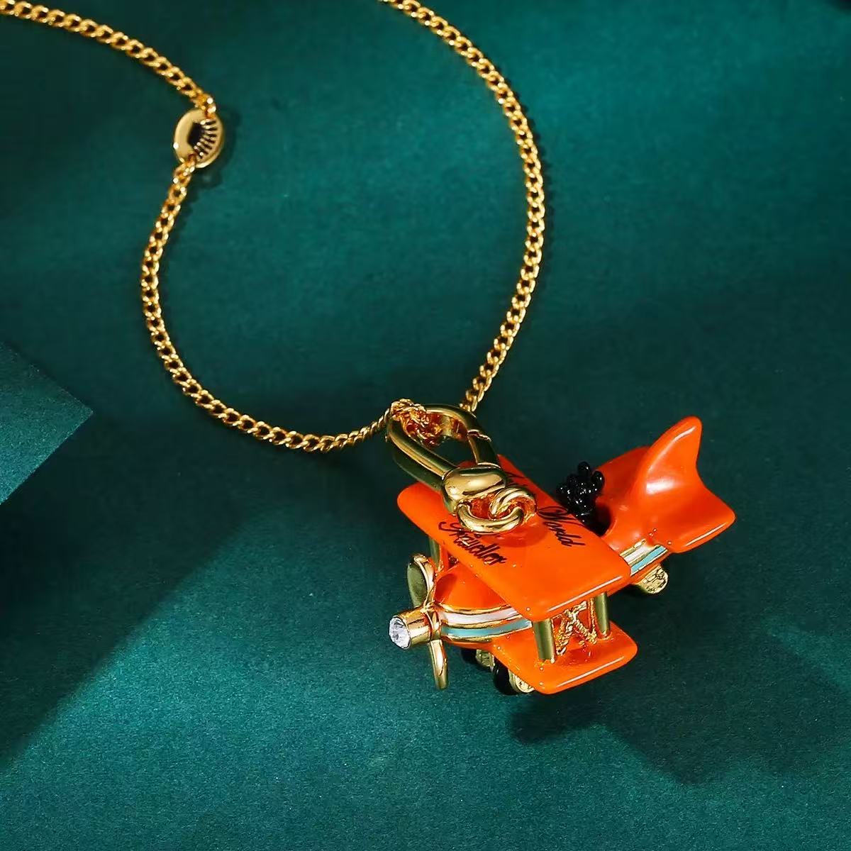 Orange Enamel Biplane Charm Necklace